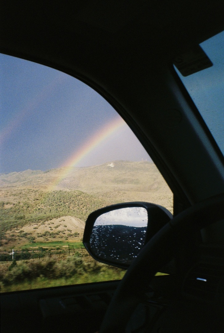 Rainbow out the car window